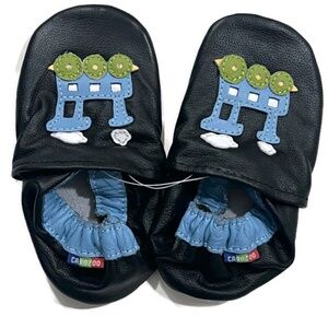 NWT Carazoo slippers with green and blue train